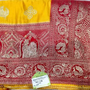 Luxurious Yellow Dola Silk Saree with Heavy Golden & Silver Zari Peacock & Floral Motifs